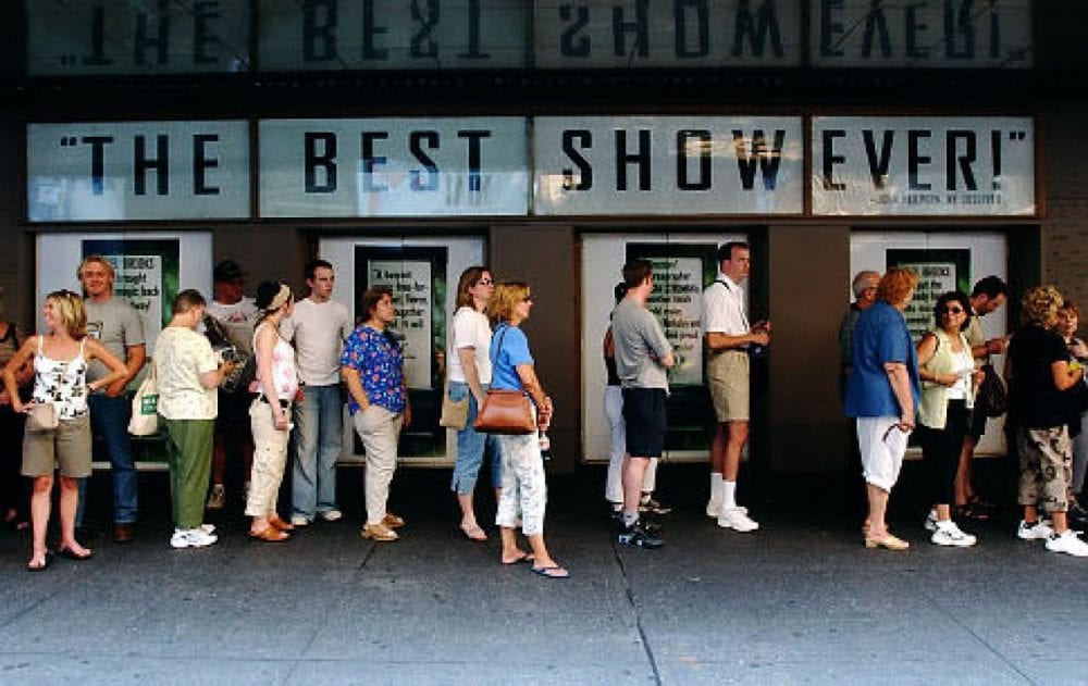 fans wait in line for a New York show.