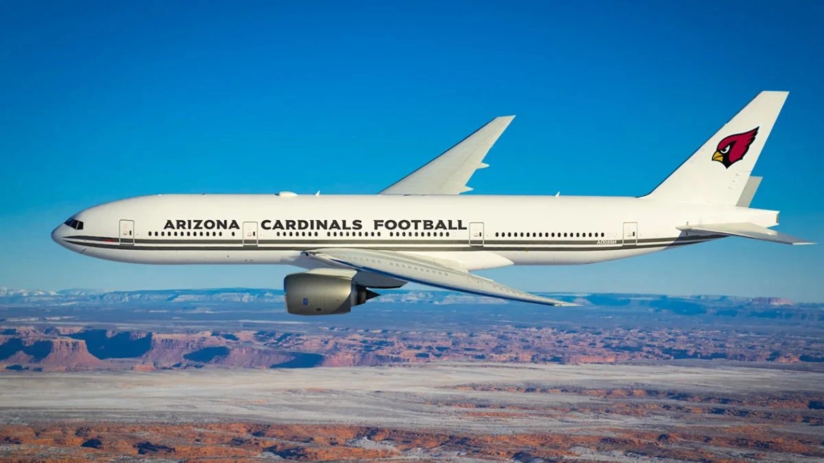 Gridiron Air Boeing 777-232ER photographed over Monument Valley | Photo by Chad Slattery via Arizona Cardinals