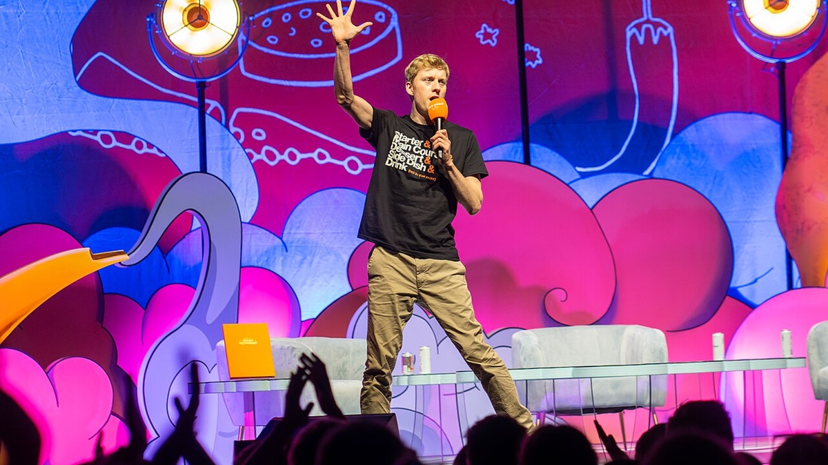 James Acaster performing Off Menu Live at Royal Albert Hall, October 2023 | Photo credit: Raph_PH via Wikimedia Commons