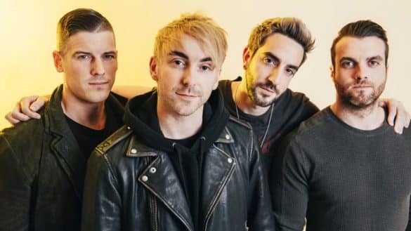 All Time Low (from left to right) Zack Merrick, Alex Gaskarth, Jack Barakat, and Rian Dawson | Photo by upsetmagazine.com via Wikimedia Commons
