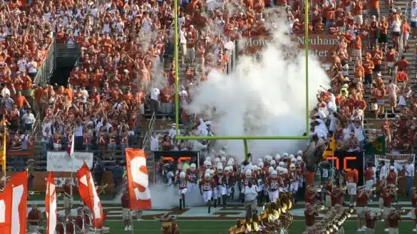 2007 Texas Longhorns football team enters the field on opening day | Photo by Johntex via Wikimedia Commons