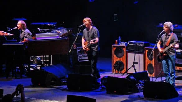 Phish on December 30, 2009 at the American Airlines Arena in Miami Florida. Left to right: Page McConnell, Trey Anastasio and Mike Gordon | Photo by Dan Shinneman via Wikimedia Commons
