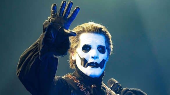 Ghost performing in 2022. Photo via ultimate-guitar.com via Wikimedia Commons