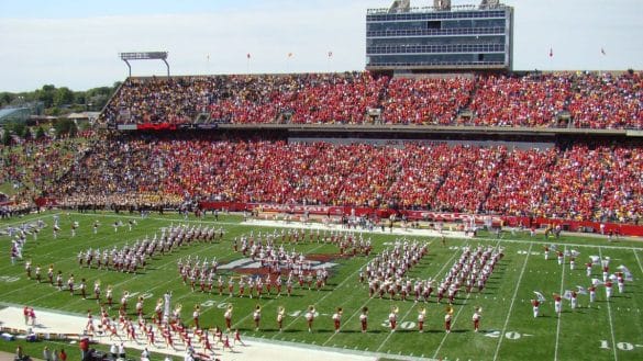 The marching band spelling "ISU" before the kickoff of the IOWA/ISU game at Jack Trice Stadium in 2007 | Photo by User K.a.zenz via Wikimedia Commons